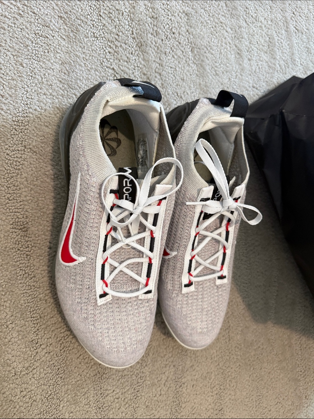 Nike Men’s Light Gray and Red Flyknit Running Shoes